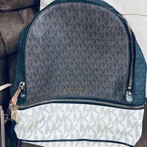 Michael Kors Brown and White Signature MK Dome Backpack
